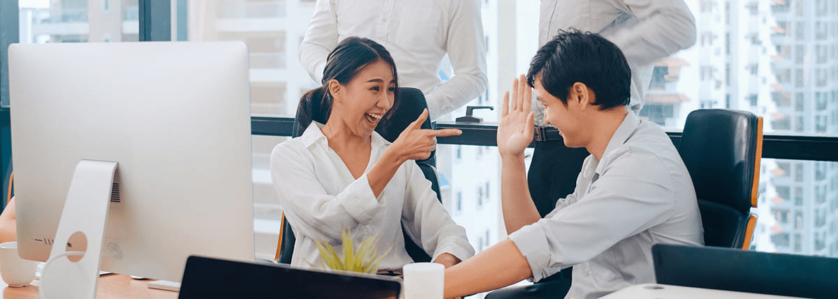 Office workers collaborating